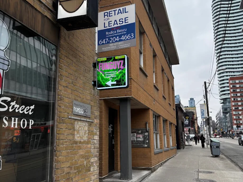 Street visible signage at Funguyz - Magic Mushroom Dispensary at Church St in Toronto