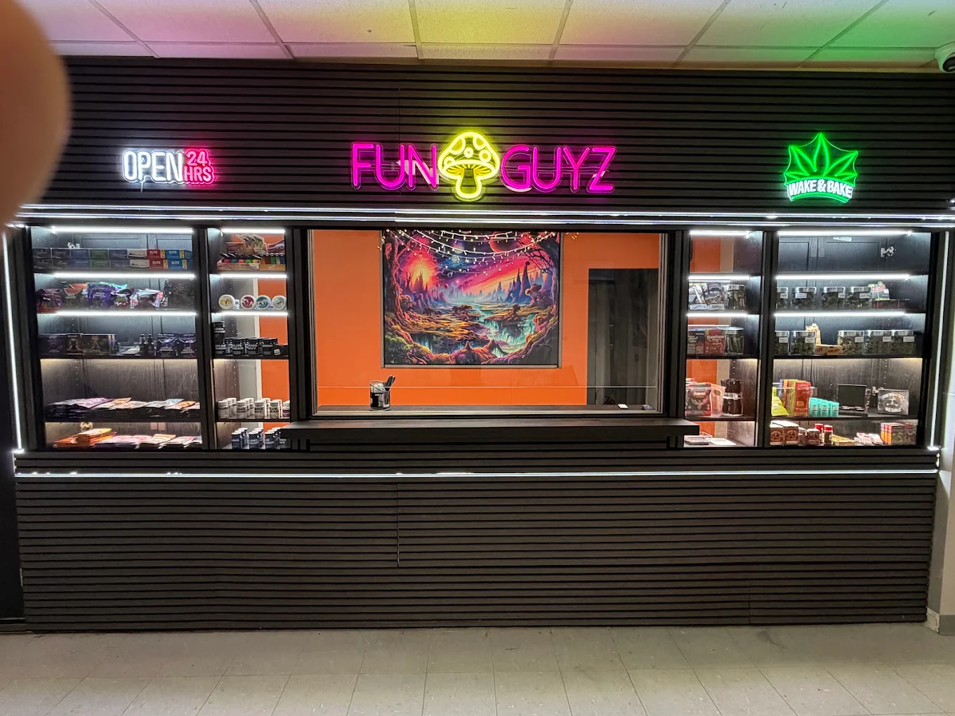 Display cases of dried mushrooms, chocolates and gummies at the Funguyz Enfield Pl store in Mississauga