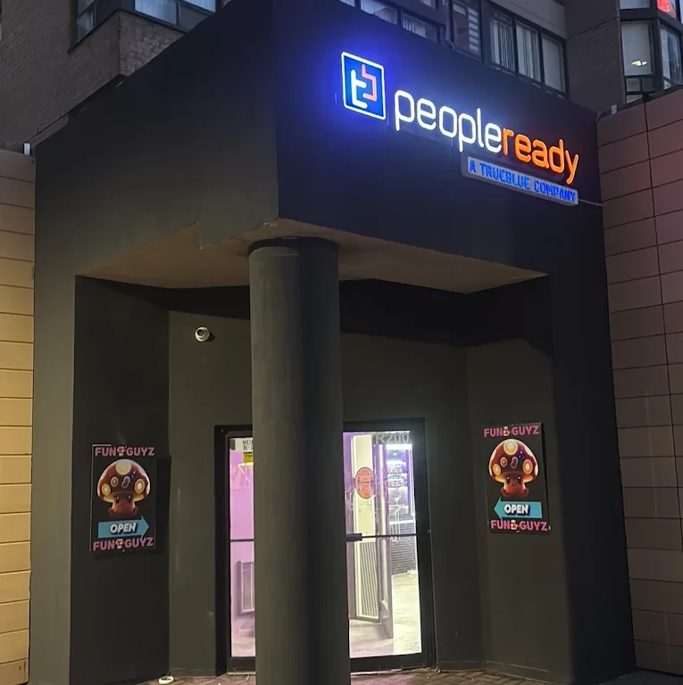 Funguyz Mississauga City Centre store entrance lit up at night at 265 Enfield Pl, open 24 hours