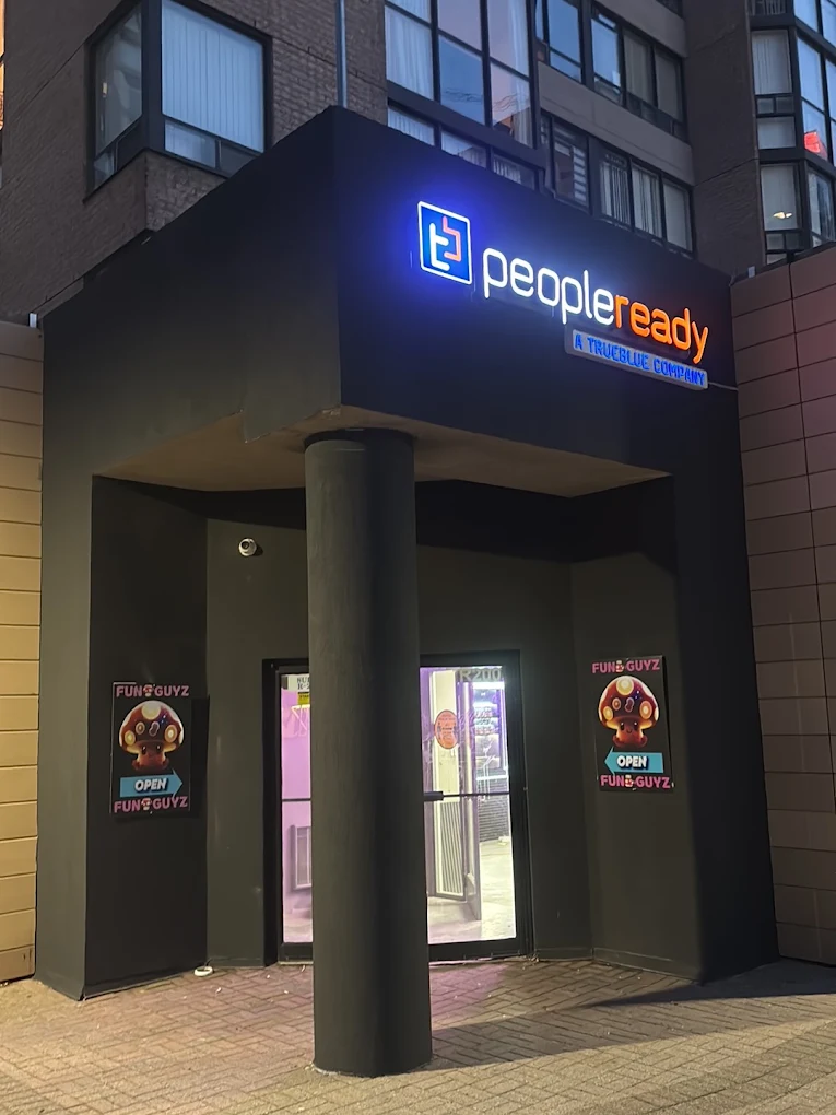 Funguyz Mississauga City Centre store entrance lit up at night at 265 Enfield Pl, open 24 hours